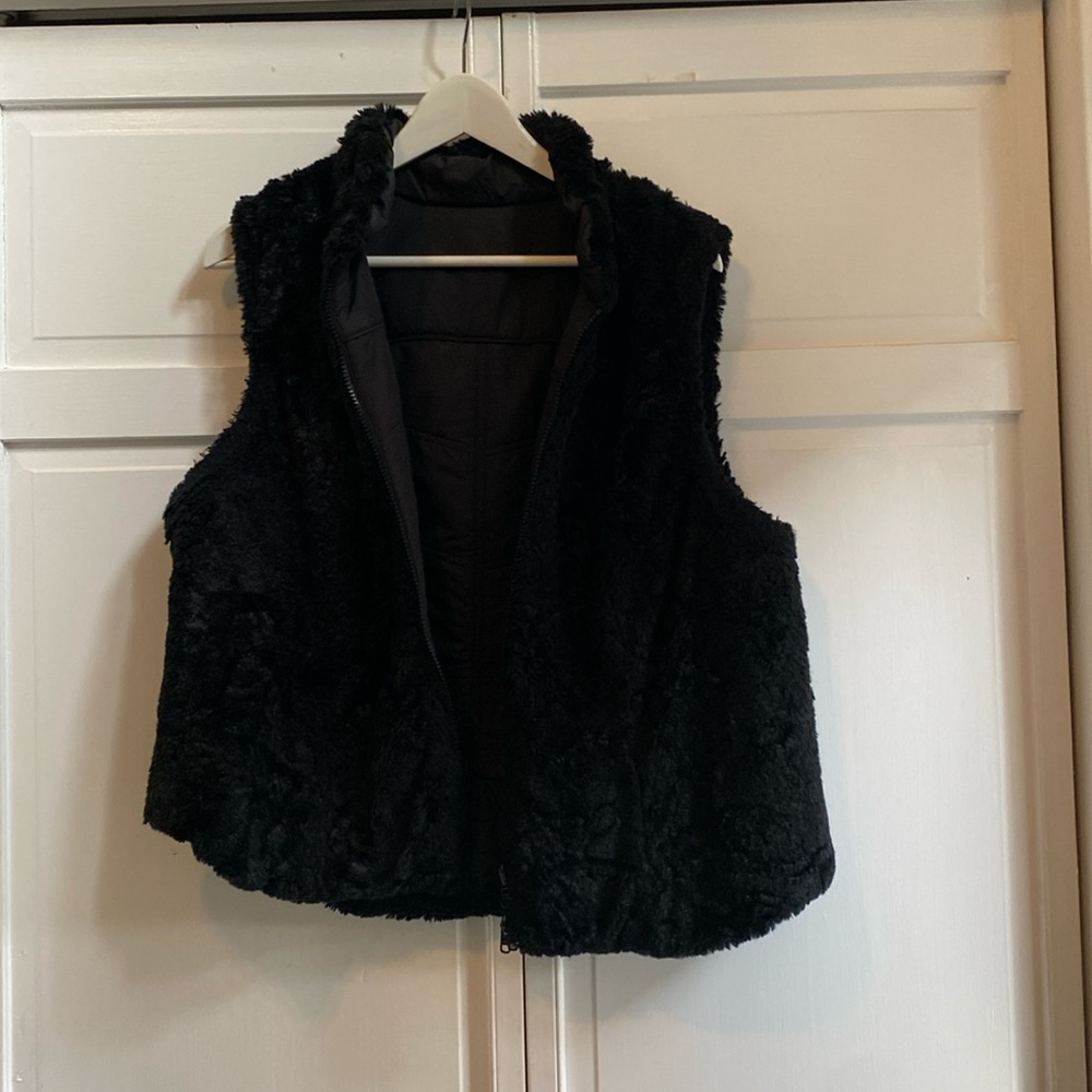 Black reversible vest